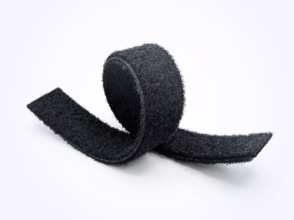 Cinta de bucle tejido de doble cara HALCO con superficies de bucle de nailon tejido en ambos lados para correas ajustables, dispositivos médicos, cierres de velcro y aplicaciones de fijación industrial.