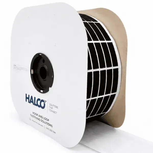 Halco reel of precision die-cut adhesive hook and loop components ready for OEM assembly.